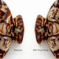 Two close up views of a tortoiseshell  hair claw clip handle on a white background, labeled 'Standard' and 'With Charm Ring' to show the included silver ring attachment charm.