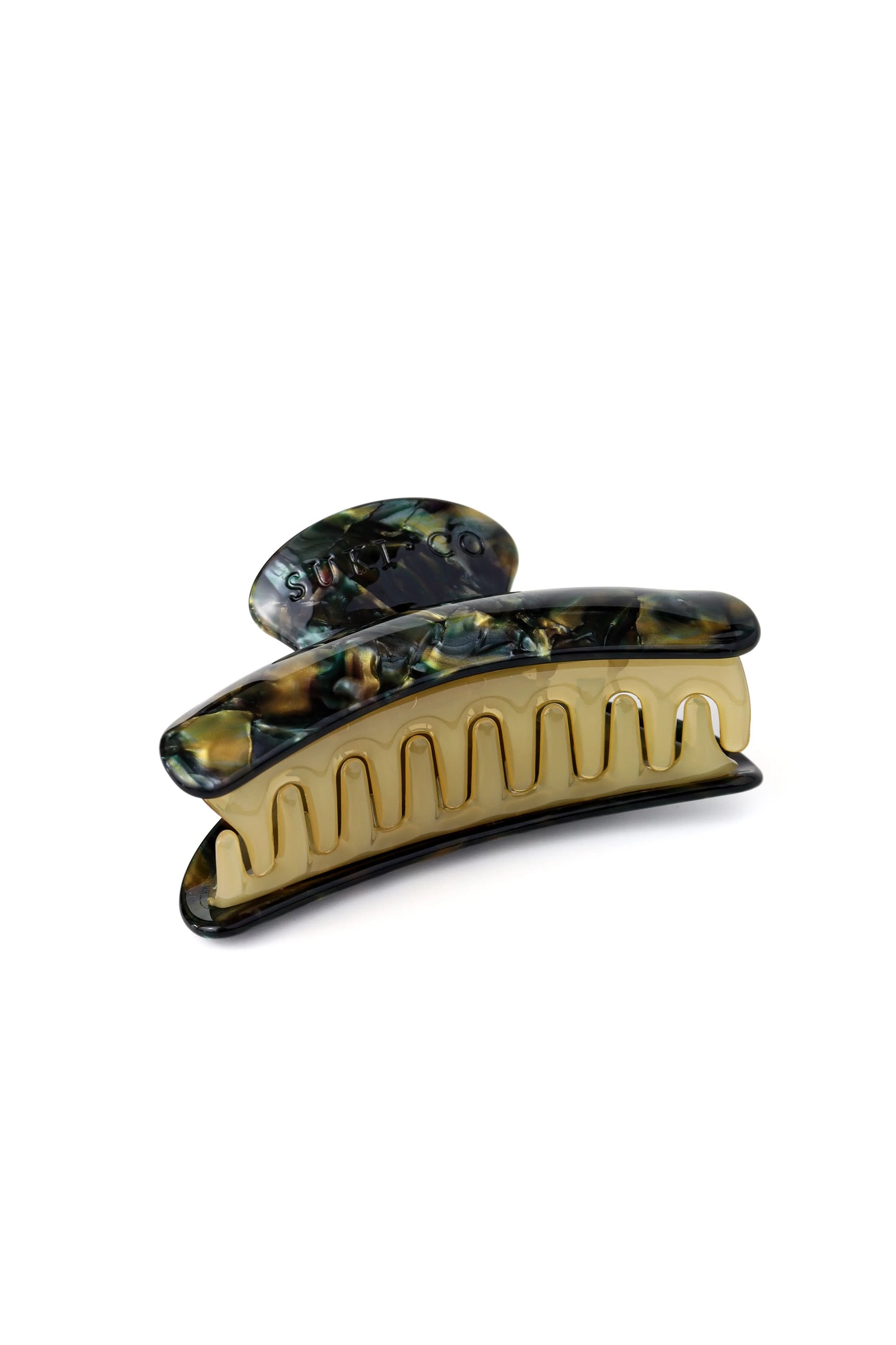 A single hair claw clip with a glossy tortoiseshell pattern in black, brown, and amber, featuring a prominent gold-toned inner jaw, set against a plain white background.